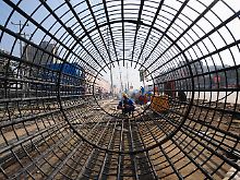 Armierungsstahl soll in der Millionenstadt Hefei eine Betonsäule verstärken: Wenn die Industrieproduktion zunimmt, wirkt sich das auch auf die Baubranche aus.