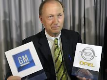 GM-Vizechef John Smith verhandelt mit Berlin.