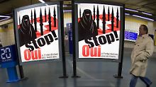 Erfolgreiche Kampagne:  Mit einer verschleierten Frau vor schwarzen Minaretten hatten die Befürworter des Verbots Stimmung gemacht.