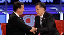 Santorum (l.) und Romney: nur optisch ähnlich.