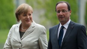Blitzbesuch mit Hindernissen: Hollande trifft Merkel