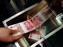 Volksgeld mit Potenzial zur Leitwährung: Chinas Wirtschaftsmacht bewegt die Märkte.