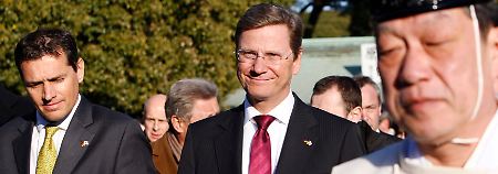 Präsentieren Deutschland im Ausland: Guido Westerwelle und Michael Mronz.
