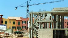 In Spanien ist der Bauboom vorerst zu Ende. Der Immobilienmarkt ist zusammengebrochen. Neue Bauten, wie hier auf Mallorca, sind kaum noch zu finanzieren. 