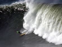 Ein Surfer und die Welle.