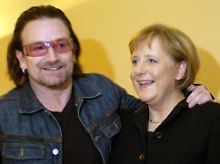 Kanzlerin Merkel mit Rocksänger Bono.