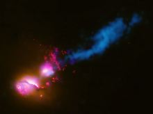 Schwarzes Loch trifft Nachbar-Galaxie: Das NASA-Bild des Zusammenstoßes im 1,4 Mrd Lichtjahre entfernten System 3C321 zeigt, wie der Jet (blauer Strahl) von der Hauptgalaxie (linker unterer Fleck) ihre begleitende Galaxie (oberer Fleck) am Rande trifft. 