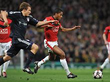Ein Wagnis: Holger Badstuber versucht, mit Manchesters Antonio Valencia mitzuhalten.