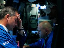 Im Auge des Sturms: Die New Yorker Wall Street - das zentrale Nervenzentrum der Weltfinanzmärkte.