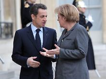 Angela Merkel und Nicolas Sarkozy machen Druck.