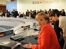 Am Tisch mit der Kanzlerin: Angela Merkel beim G20-Gipfel in Toronto.