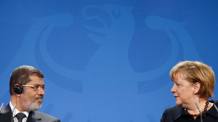 Mursi und Merkel: Realpolitik.