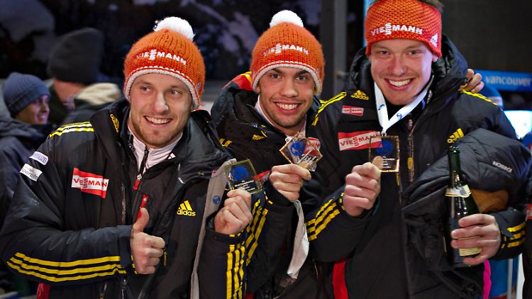 Die bayerische WM-WG: Tobias Arlt, Tobias Wendl und Felix Loch (v.l.).
