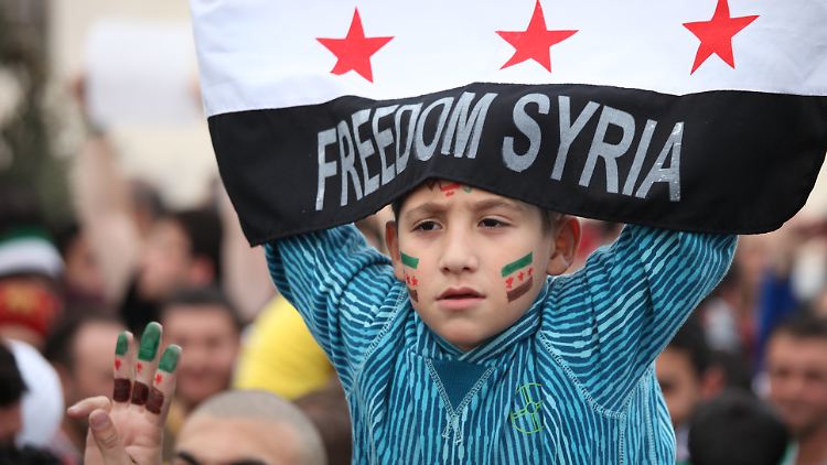 Im jordanischen Amman feiern Menschen den zweiten Jahrestag des Beginns des Aufstands.