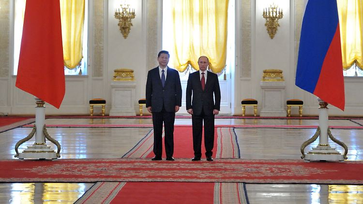 Xi Jinping und Wladimir Putin im Kreml.