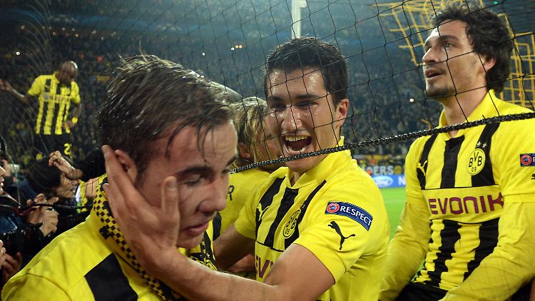 "Dieses Spiel wird in der Vereinshistorie einen festen Platz einnehmen": Mario Götze, Nuri Sahin und Mats Hummels.