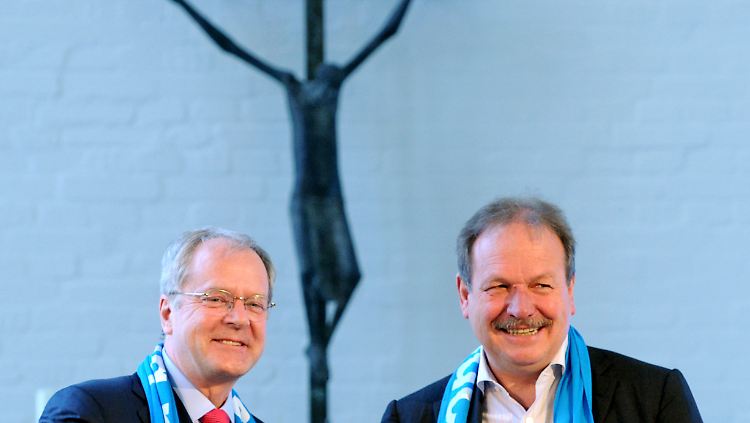 Kirchentagspräsident Robbers und Verdi-Chef Bsirske.