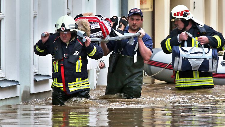 Die Innenstadt wurde evakuiert, die Menschen tun, was getan werden muss. Doch Resignation macht sich breit.