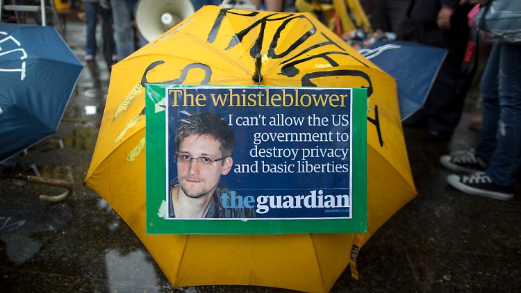 Snowden-Solidaritätsmarsch in Hong Kong. Der "Whistleblower" ging davon aus, dass ihn die US-Justiz mit aller Härte verfolgen wird.