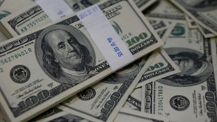 "Greenback" im Bündel: In einer Bank in Seoul liegen sauber sortierte Hunderter zur Ausgabe bereit.