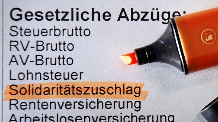 Der Solidaritätszuschlag wurde vor rund 20 Jahren eingeführt.