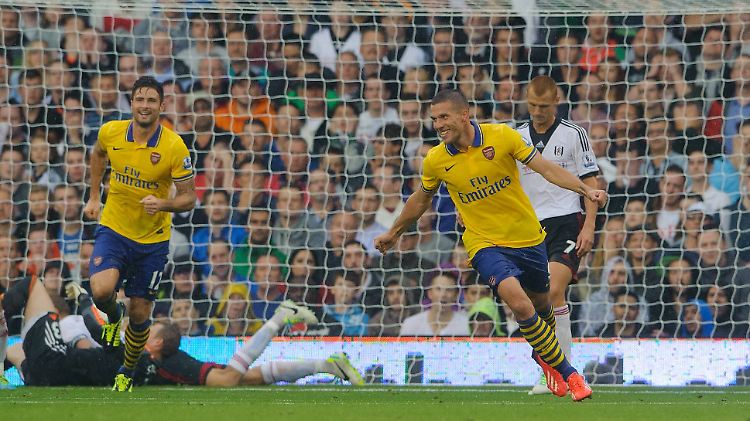 "Jeder in der Mannschaft liebt Podolski", sagt Arsenal-Coach Wenger über seinen Doppeltorschützen gegen Fulham.