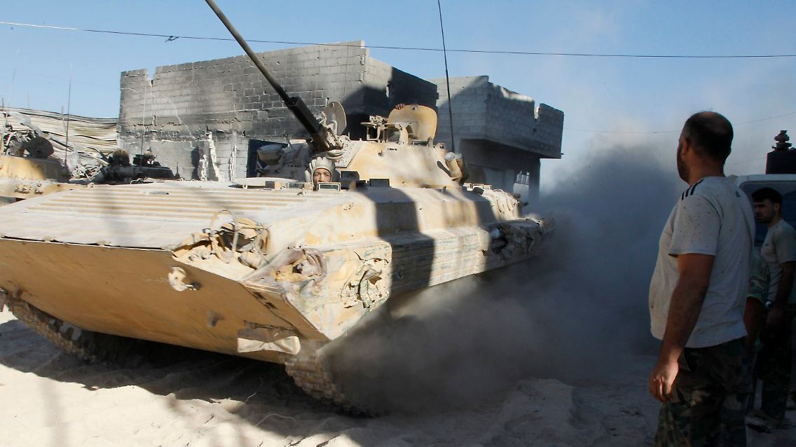 2013-08-24T163154Z_1876605089_GM1E98P01BE01_RTRMADP_3_SYRIA-CRISIS-JOBAR.JPG931086736327339657.jpg