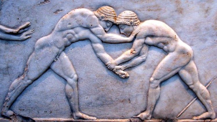 Zähes Ringen: Auf einer Bodenplatte einer Statue im Archäologischen Museum von Athen sind zwei Ringer abgebildet.