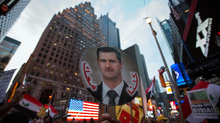 Das Gesicht der Krise: Pro-Assad-Demostration am New Yorker Times Square.