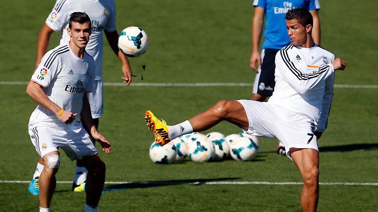 Passt 100-Millionen-Mann Gareth Bale (l.) ins Weiße Ballett von Real Madrid - und zu Vortänzer Cristiano Ronaldo (r.)?