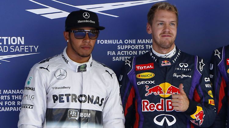 Vettel (l.) dominiert derzeit die Formel 1. Hamilton hält ihn trotzdem nicht für den schnellsten Fahrer.
