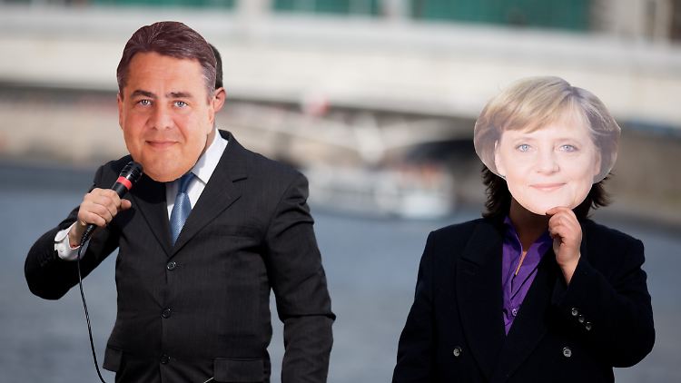 Demonstranten tragen zu Beginn der Sondierungsgespräche zwischen Union und SPD Masken der Parteichefs Merkel und Gabriel.