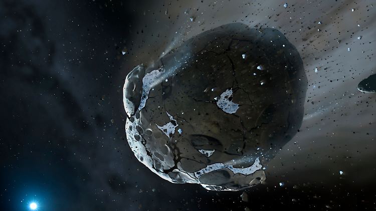 Illustration: steiniger und wasserreicher Asteroid in der Anziehungskraft des weißen Zwergs GD 61.
