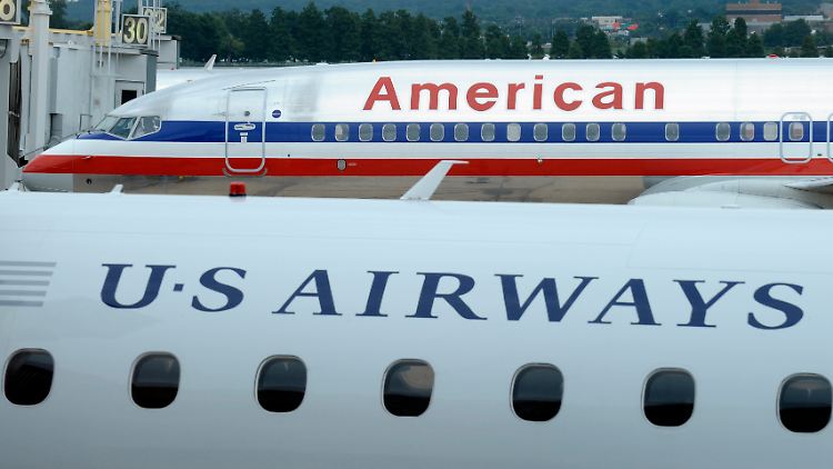 Fliegen schon bald unter einem Logo: Zwei Jets der frisch fusionierten Fluglinien
