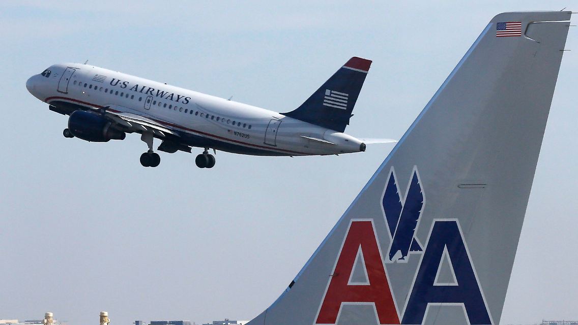 2013-11-12T200908Z_460998938_WM1E96J0Y9N01_RTRMADP_3_US-AMR-USAIR-ANTITRUST.JPG2014070501974782026.jpg