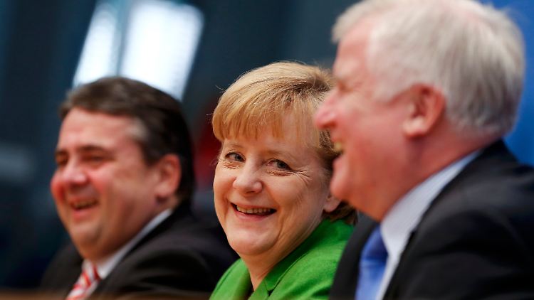 Humor ist, wenn man trotzdem lacht: Die Großkoalitionäre stellen ihren Vertrag vor.