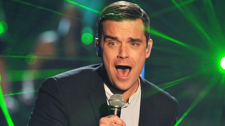 Warum bringt er den Rest von Take That nicht gleich mit? Robbie Williams.
