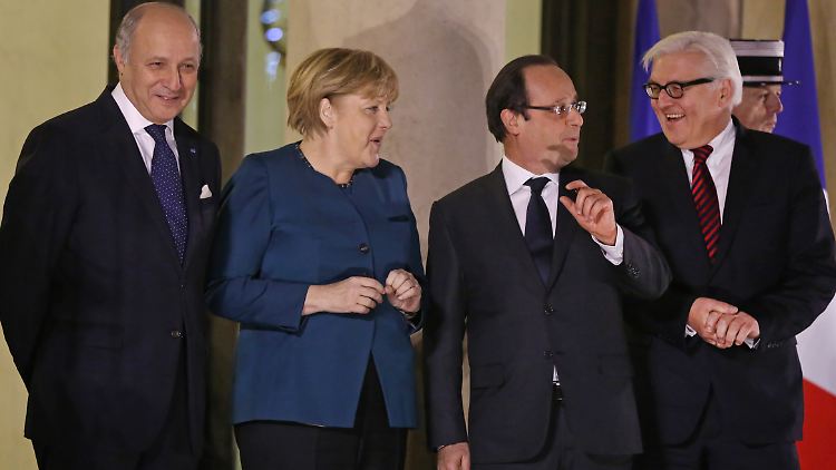 Fabius, Merkel, Hollande und Steinmeier - ein neues Kapitel soll beginnen.