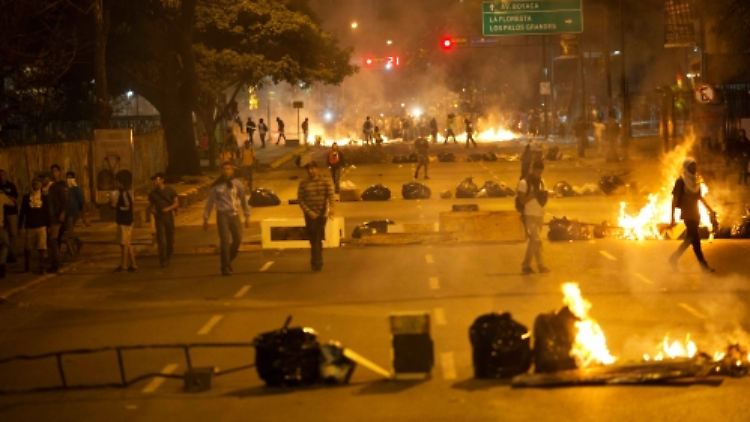In Caracas eskaliert die Gewalt zwischen Demonstranten, Polizei und paramilitärischen Gruppen immer weiter.