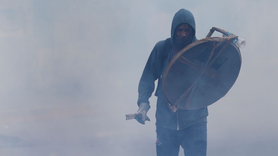 2014-03-08T222235Z_899959600_GM1EA390H9201_RTRMADP_3_VENEZUELA-PROTESTS.JPG2559043962204652518.jpg