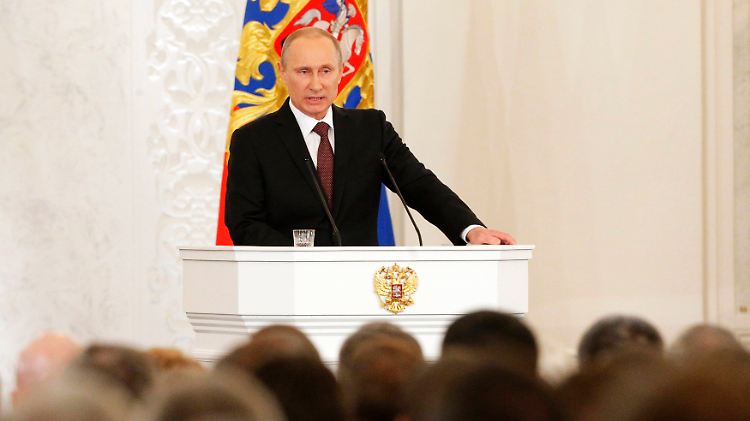 2014-03-18T114437Z_998842086_GM1EA3I1IPX01_RTRMADP_3_UKRAINE-CRISIS-PUTIN.JPG7515735596486556176.jpg