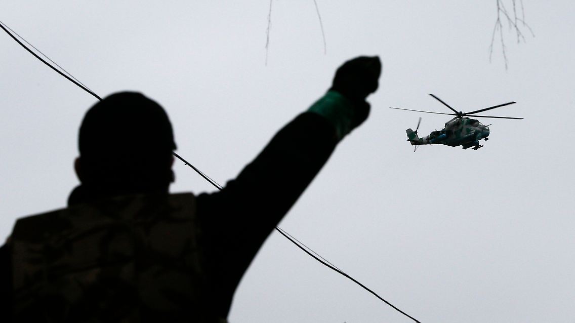2014-04-13T073504Z_1526056829_GM1EA4D174V01_RTRMADP_3_UKRAINE-CRISIS-SLAVIANSK-AVAKOV.JPG6611468587001205141.jpg
