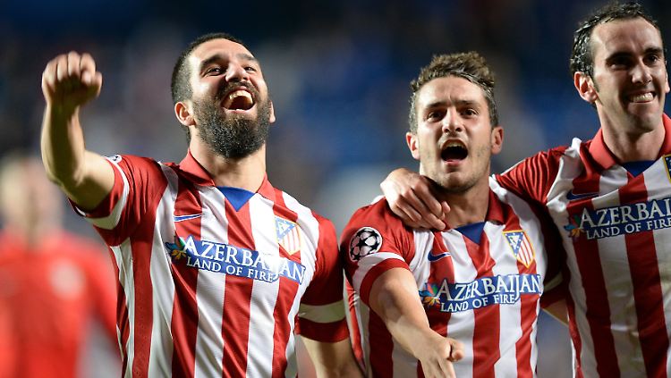 "Die größte Atlético-Elf aller Zeiten": Die Herren Arda Turan, Koke und Diego Godin feiern in London.