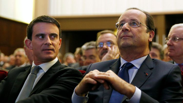 Frankreichs Premierminister Manuel Valls (links) sagte, dass Präsident Hollande nach der Europawahl Initiativen für eine "aktive Währungspolitik" starten wolle.