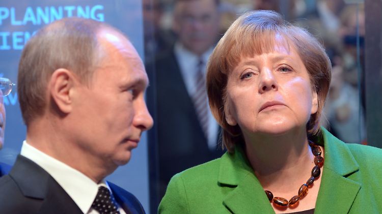 Angela Merkel und Wladimir Putin bei einer Begegnung im April 2013.