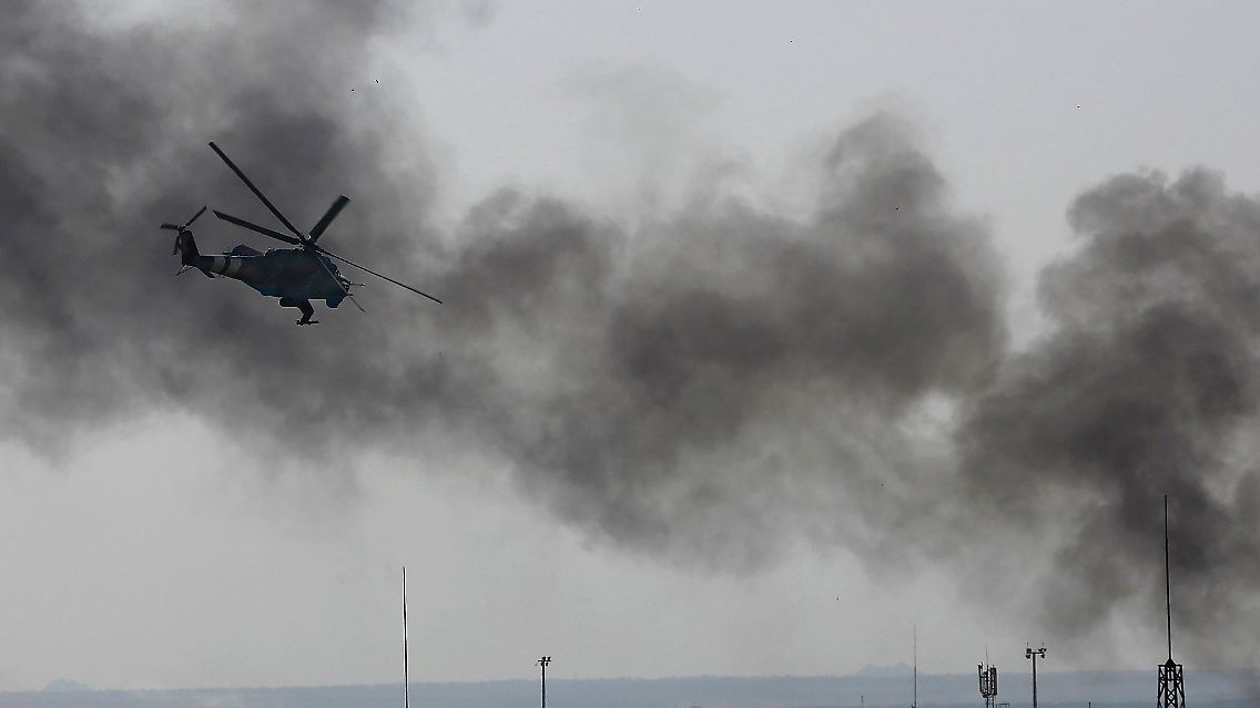 2014-05-26T162126Z_1227058134_GM1EA5R00TG01_RTRMADP_3_UKRAINE-CRISIS-AIRPORT.JPG3021723027438177722.jpg