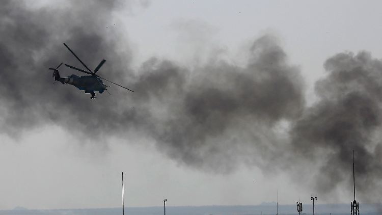 2014-05-26T162126Z_1227058134_GM1EA5R00TG01_RTRMADP_3_UKRAINE-CRISIS-AIRPORT.JPG3021723027438177722.jpg