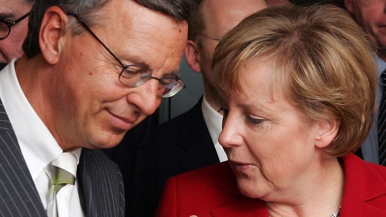 Bosbach und Merkel bei einem Auftritt im Jahre 2006. 