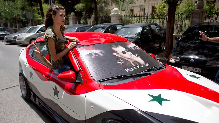 Assad-Anhänger freuen sich.