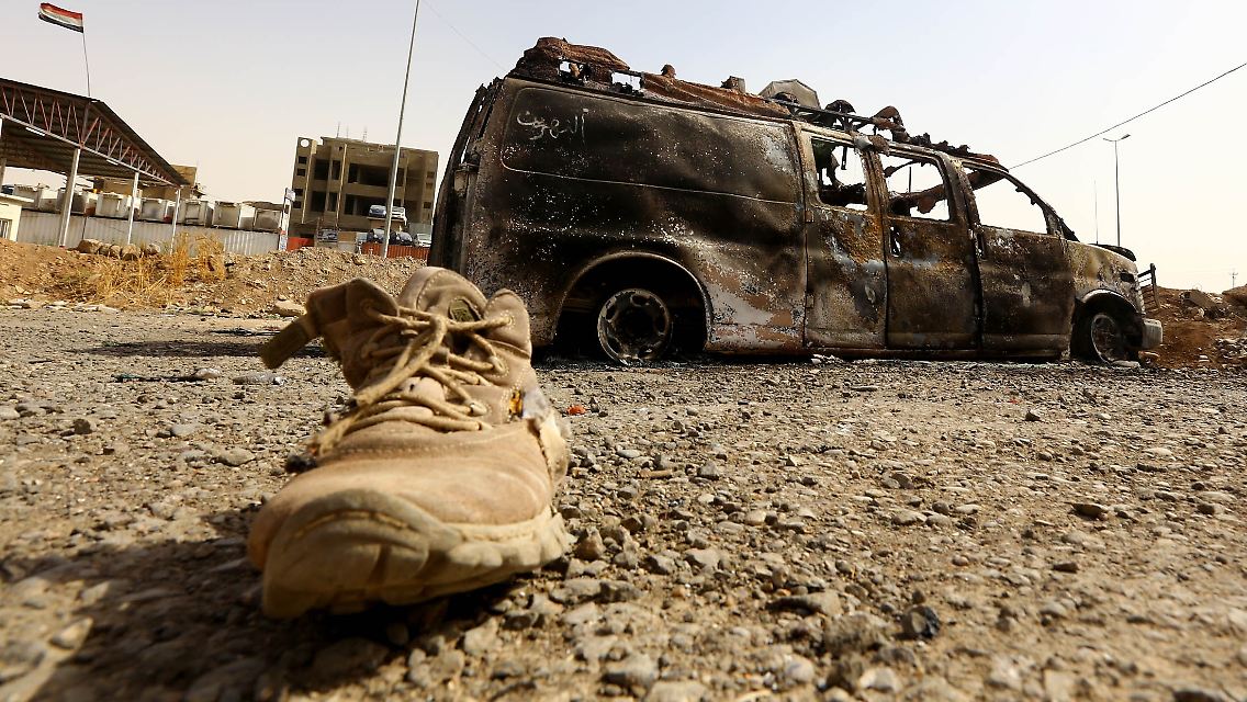 2014-06-11T170330Z_1187460954_GM1EA6C02RY01_RTRMADP_3_IRAQ-SECURITY.JPG4083439754184240720.jpg